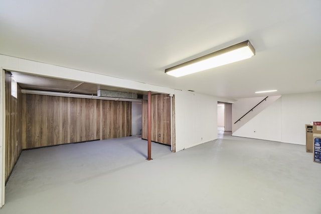 923 Maple St, Ludington, MI 49431 - finished below grade area with stairway and wooden walls