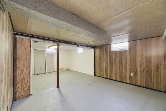923 Maple St, Ludington, MI 49431 - below grade area with wood walls