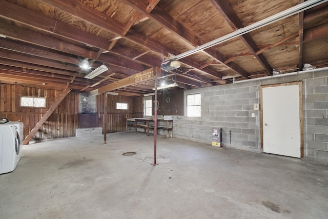 923 Maple St, Ludington, MI 49431 - below grade area with washer / clothes dryer and concrete block wall