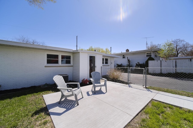 923 Maple St, Ludington, MI 49431 - view of patio / terrace with fence and a gate