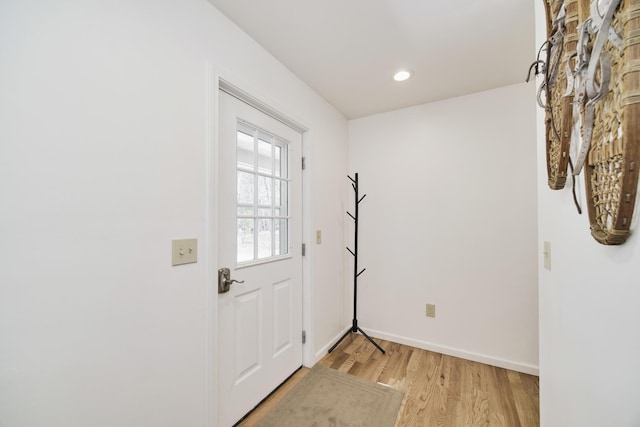 2073 Gunn Rd, Manistee, MI 49660 - entryway with light wood-type flooring, baseboards, and recessed lighting