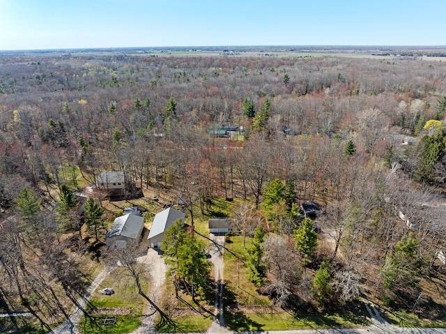 drone / aerial view of a heavily wooded area