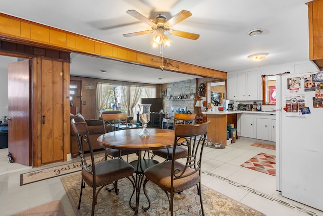 dining room with ceiling fan