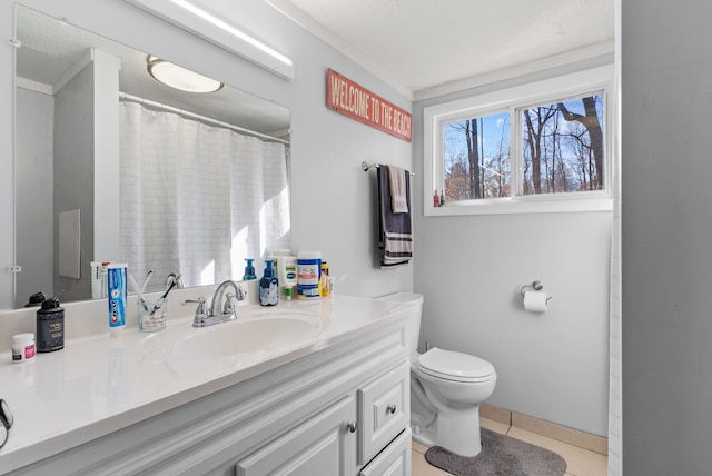 full bath featuring tile patterned floors, vanity, and toilet