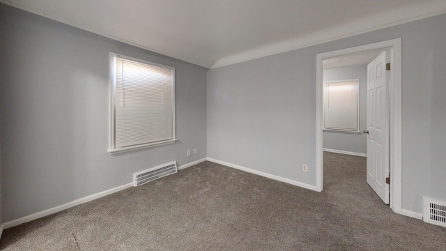 20026 Joann St, Detroit, MI 48205 - empty room featuring dark carpet and baseboards