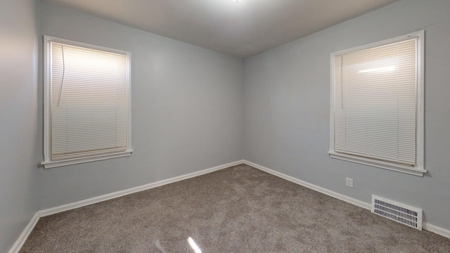 20026 Joann St, Detroit, MI 48205 - empty room featuring carpet flooring and baseboards