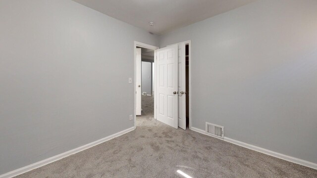 20026 Joann St, Detroit, MI 48205 - carpeted empty room with baseboards