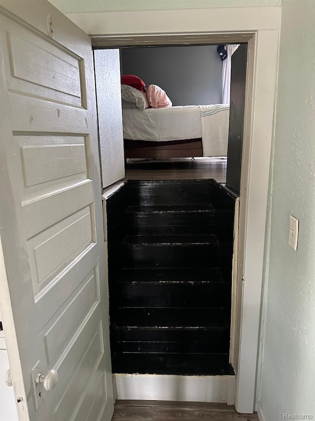 7980 W Gilford Rd, Reese, MI 48757 - staircase featuring wood finished floors