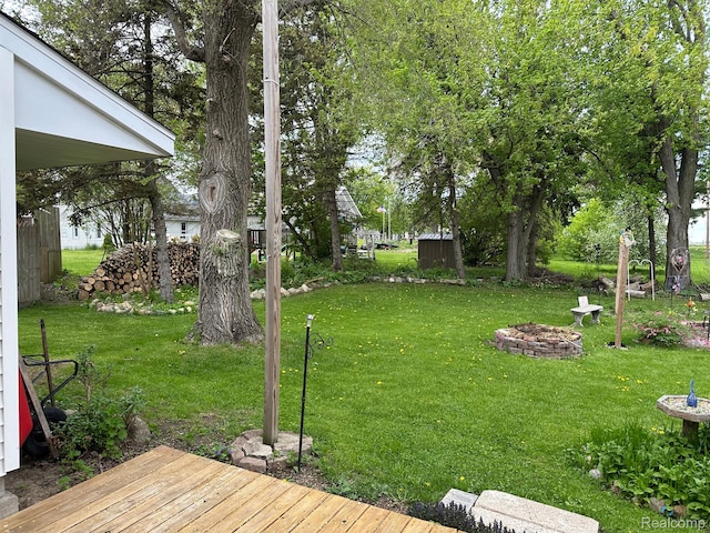 7980 W Gilford Rd, Reese, MI 48757 - view of grassy yard with a deck
