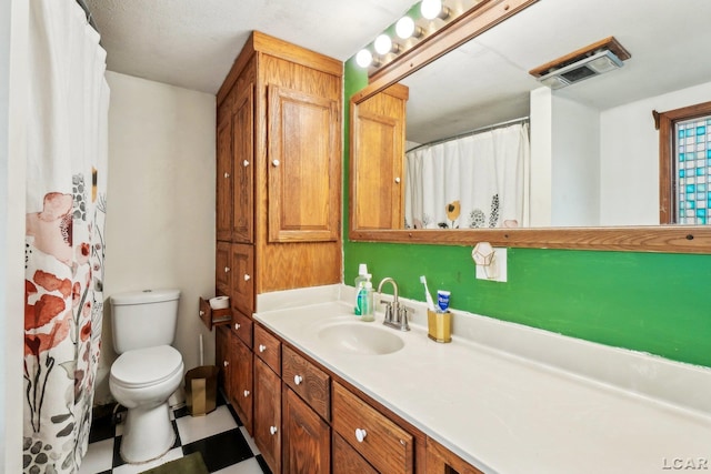 126 Litchfield St, Clinton, MI 49236 - bathroom with toilet and vanity