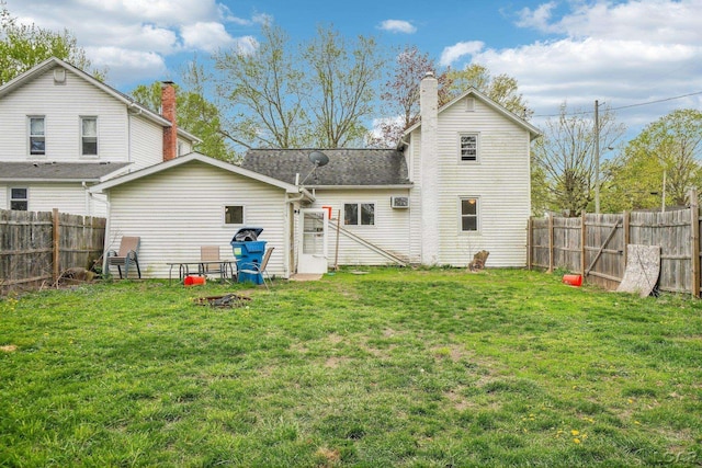 126 Litchfield St, Clinton, MI 49236 - rear view of property featuring a chimney and a shingled roof
