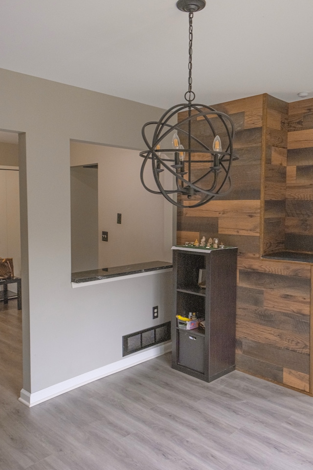 726 Hamilton, Rochester Hills, MI 48307 - spare room featuring wood finished floors, a chandelier, and baseboards