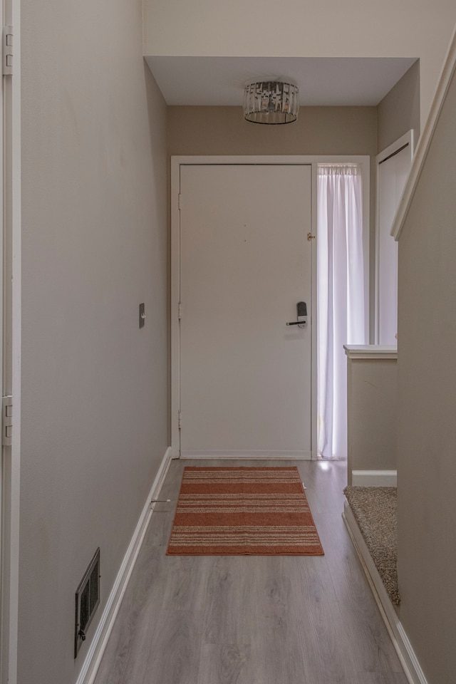 726 Hamilton, Rochester Hills, MI 48307 - entryway with wood finished floors and baseboards