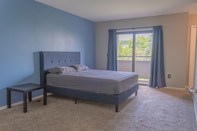 726 Hamilton, Rochester Hills, MI 48307 - carpeted bedroom featuring baseboards and access to exterior