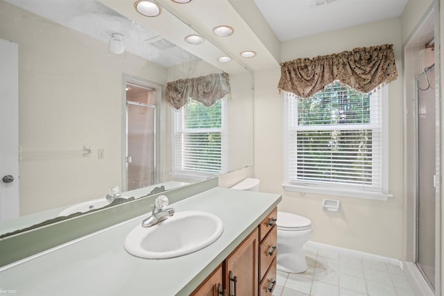 bathroom featuring baseboards, a stall shower, vanity, toilet, and recessed lighting