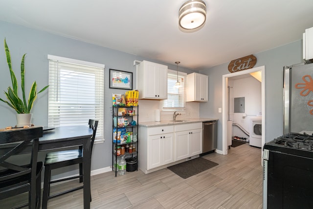 kitchen featuring appliances with stainless steel finishes, white cabinets, baseboards, light stone counters, and pendant lighting