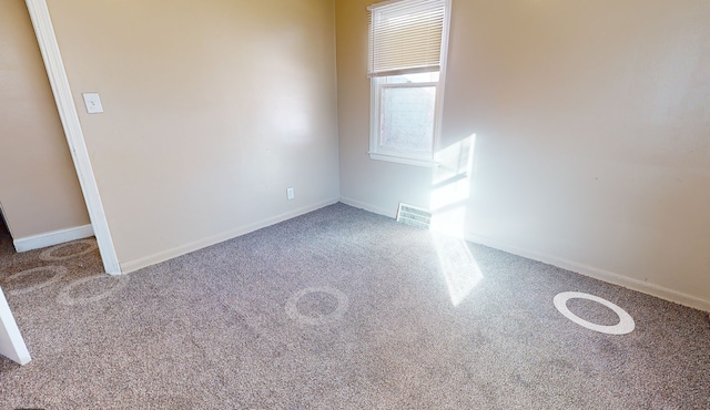 19720 Asbury Park, Detroit, MI 48235 - carpeted spare room featuring baseboards