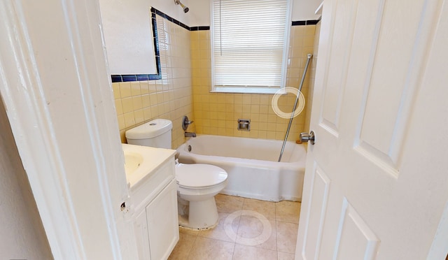 19720 Asbury Park, Detroit, MI 48235 - bathroom with toilet, tile patterned floors, vanity,  shower combination, and tile walls