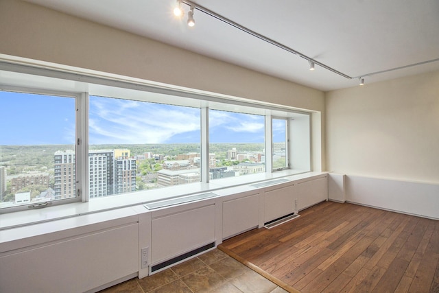 555 E William St Unit 25I, Ann Arbor, MI 48104 - empty room featuring rail lighting and a view of city