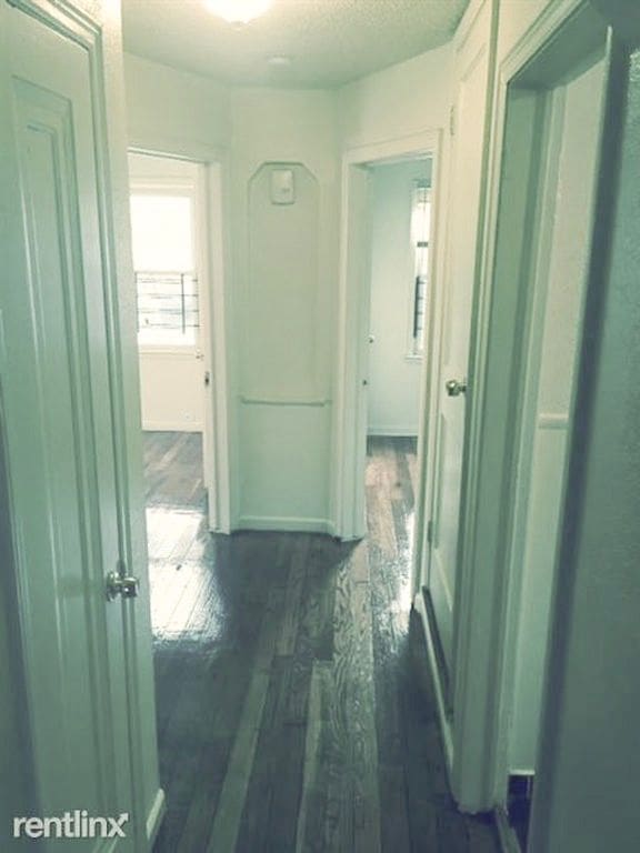 20244 Fairport St, Detroit, MI 48205 - hallway with dark wood-style floors