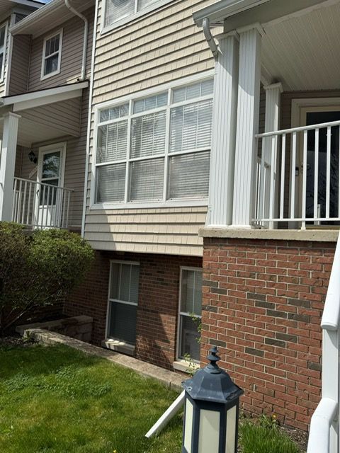 11702 Weingartz E, Utica, MI 48315 - view of home's exterior with brick siding