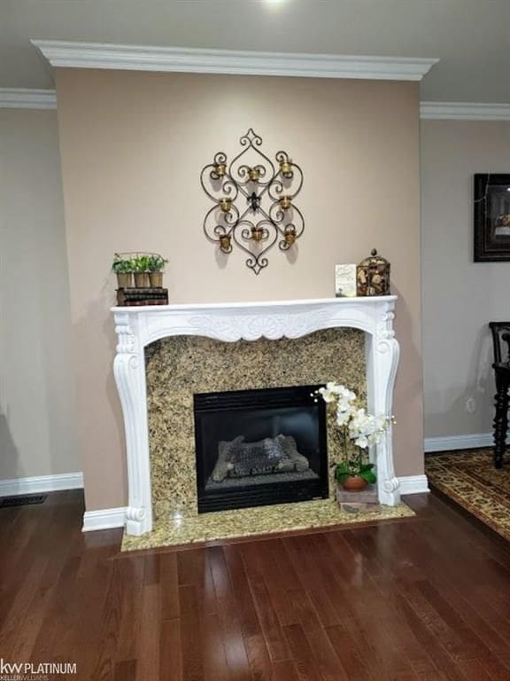 11702 Weingartz E, Utica, MI 48315 - detailed view of wood finished floors, a premium fireplace, ornamental molding, and baseboards