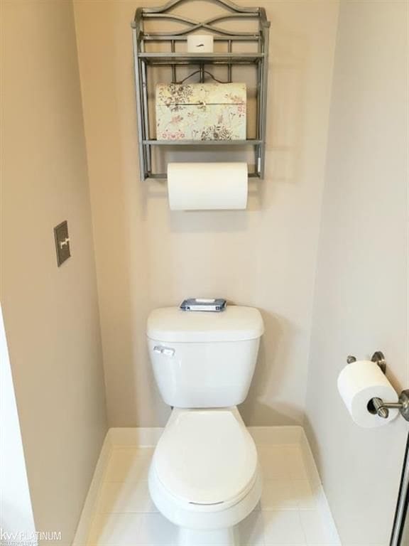11702 Weingartz E, Utica, MI 48315 - bathroom featuring toilet, baseboards, and tile patterned flooring