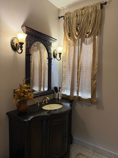 11702 Weingartz E, Utica, MI 48315 - bathroom with tile patterned flooring and vanity