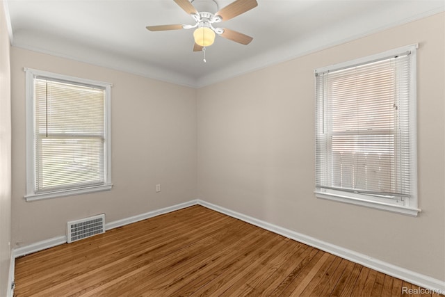 19327 Sunset St, Detroit, MI 48234 - empty room with baseboards, wood finished floors, ceiling fan, and ornamental molding