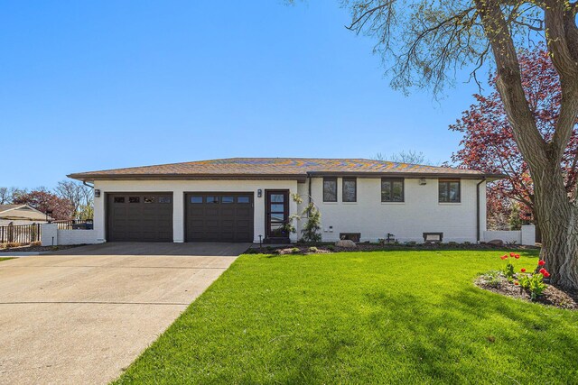 55 Gabriel Dr, South Haven, MI 49090 - view of front of property with concrete driveway, an attached garage, and brick siding