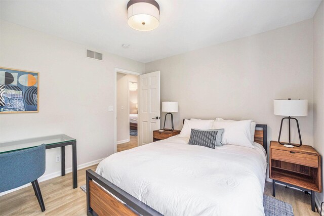 55 Gabriel Dr, South Haven, MI 49090 - bedroom with light wood-style floors and baseboards