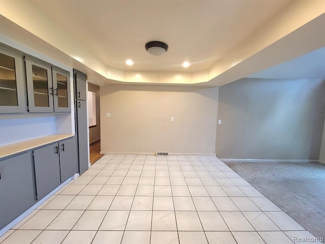 28142 Liberty Dr, Warren, MI 48092 - empty room with a tray ceiling, recessed lighting, baseboards, and light colored carpet