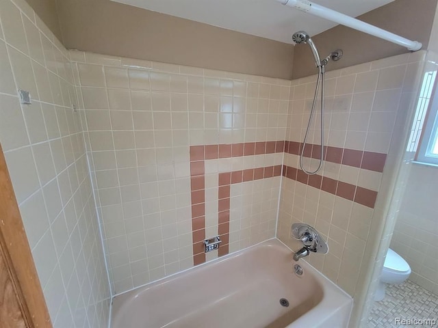 28142 Liberty Dr, Warren, MI 48092 - bathroom with toilet, washtub / shower combination, and tile patterned flooring