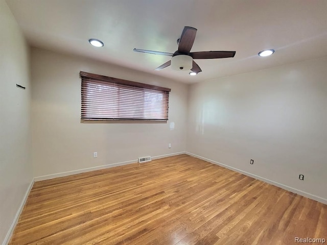 28142 Liberty Dr, Warren, MI 48092 - spare room with baseboards, light wood-style flooring, recessed lighting, and a ceiling fan