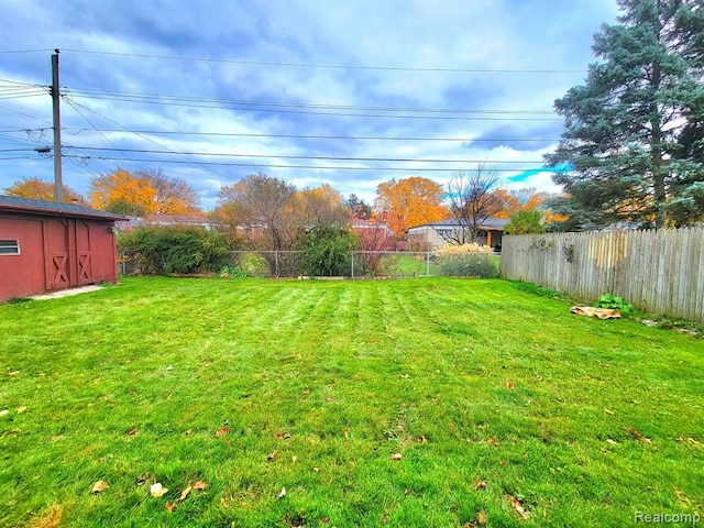 28142 Liberty Dr, Warren, MI 48092 - view of yard with a shed and an outbuilding