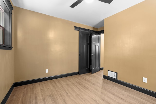 137 Wiltshire Ave, Battle Creek, MI 49015 - unfurnished room with light wood finished floors and ceiling fan