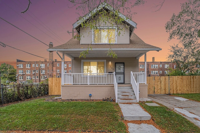 208 Hill St, Highland Park, MI 48203 - view of front facade with covered porch and a shingled roof