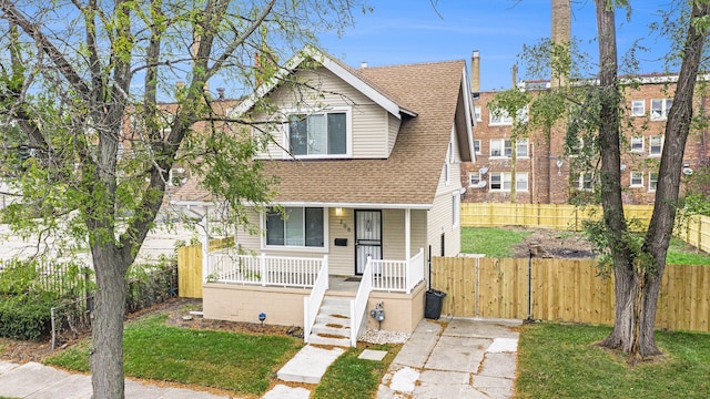 208 Hill St, Highland Park, MI 48203 - view of front of house with covered porch and roof with shingles