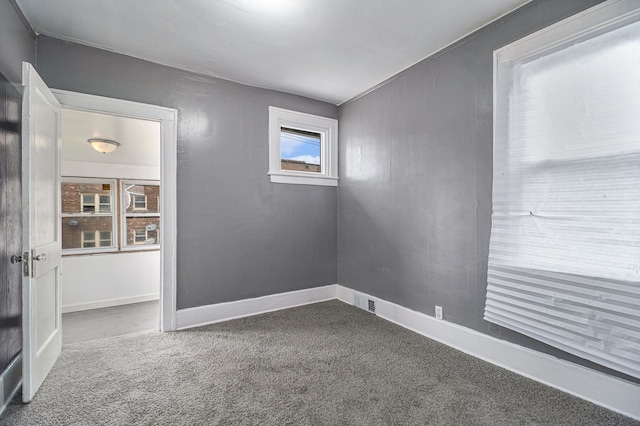 208 Hill St, Highland Park, MI 48203 - empty room featuring carpet flooring and baseboards