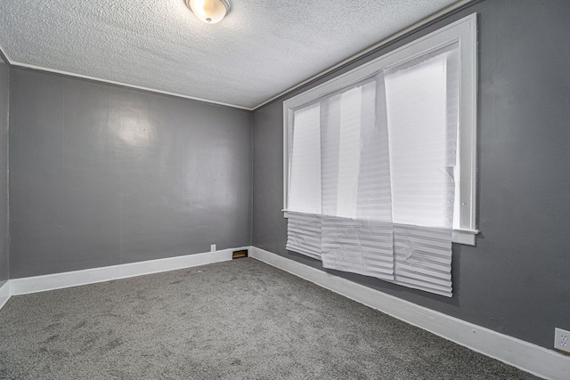 208 Hill St, Highland Park, MI 48203 - carpeted empty room with a textured ceiling and baseboards