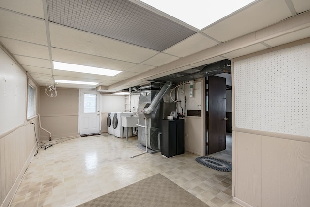 841 Driburg Dr, Commerce Twp, MI 48390 - basement featuring washer and dryer, wainscoting, and tile patterned floors