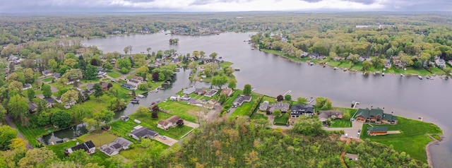 841 Driburg Dr, Commerce Twp, MI 48390 - aerial view of property and surrounding area with a nearby body of water, a forest, and nearby suburban area