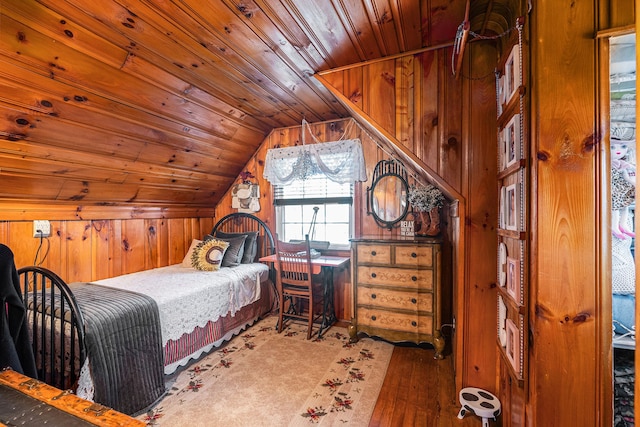 1107 E Lincoln Ave, Royal Oak, MI 48067 - bedroom with vaulted ceiling, wood ceiling, wooden walls, and hardwood / wood-style flooring