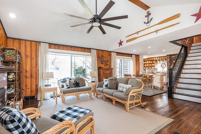 1107 E Lincoln Ave, Royal Oak, MI 48067 - living area featuring a ceiling fan, wooden walls, stairway, dark wood-style flooring, and recessed lighting