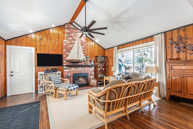 1107 E Lincoln Ave, Royal Oak, MI 48067 - living area with lofted ceiling, ceiling fan, wooden walls, a fireplace, and dark wood-style floors