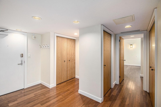 555 E William St Unit 25J, Ann Arbor, MI 48104 - hall with wood finished floors, baseboards, and recessed lighting