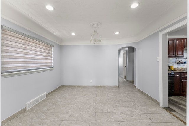 10436 Bertram St, Dearborn, MI 48126 - unfurnished room featuring arched walkways, recessed lighting, a chandelier, crown molding, and baseboards