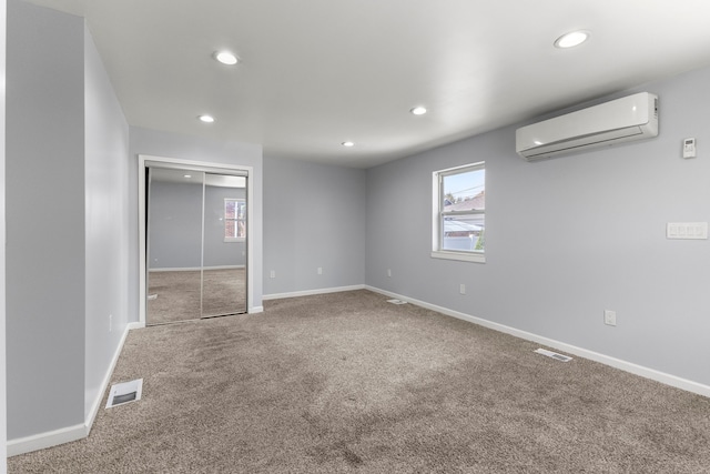 10436 Bertram St, Dearborn, MI 48126 - below grade area featuring an AC wall unit, carpet, plenty of natural light, recessed lighting, and baseboards
