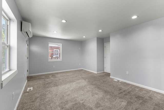 10436 Bertram St, Dearborn, MI 48126 - carpeted spare room featuring a wall unit AC, recessed lighting, and baseboards