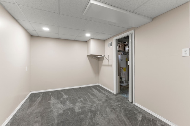 10436 Bertram St, Dearborn, MI 48126 - finished below grade area featuring gas water heater, carpet flooring, a drop ceiling, baseboards, and recessed lighting